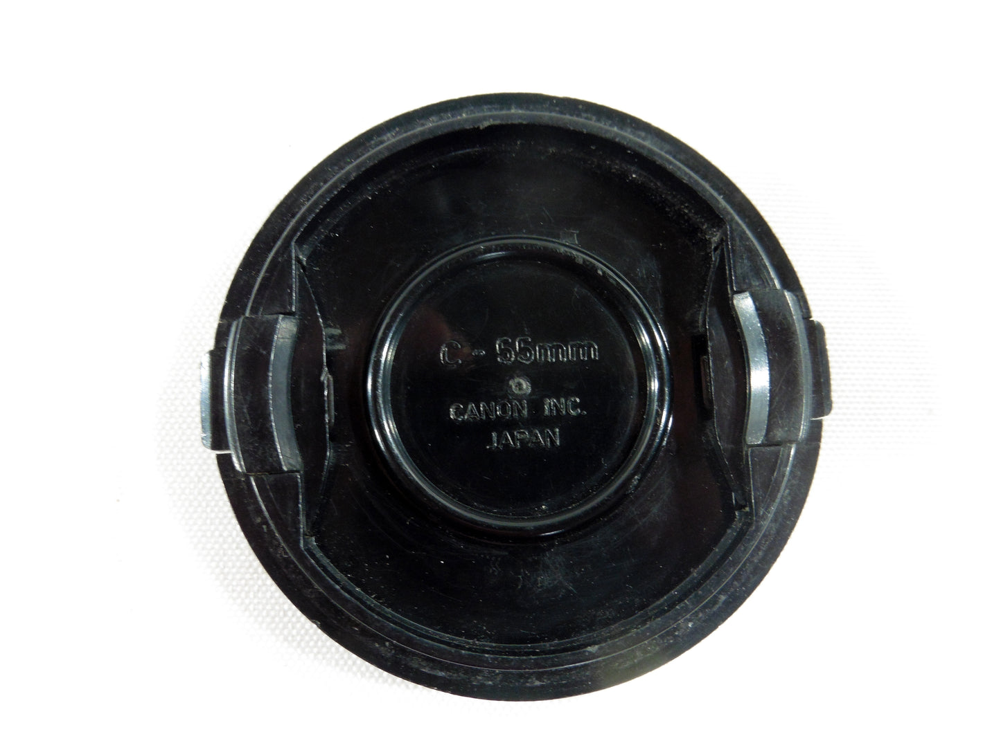 Canon bouchon Original des Jeux Olympiques d'été de Montréal 1976.Diamètre 55mm.Original lens cap 55mm of the World Summer Olympic games of Montréal 1976.