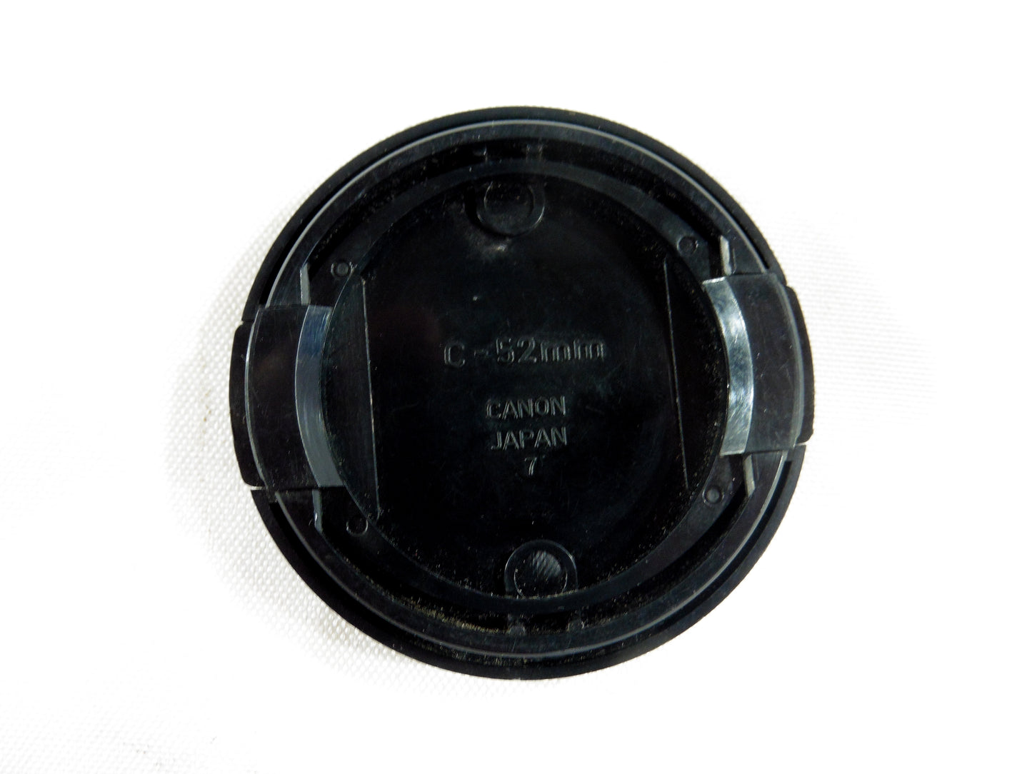 Canon bouchon officiel des jeux Olympiques d'Hiver 1980.The Official 35mm Camera of the 1980 Olympic Winter Games.Original Cap.Diamètre 52mm.