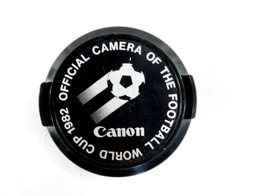 Canon bouchon Official Camera of the Football World Cup 1982.Original Cap.Appareil Photo Canon Officiel de la Coupe du Monde 1982.Diamètre 52mm.